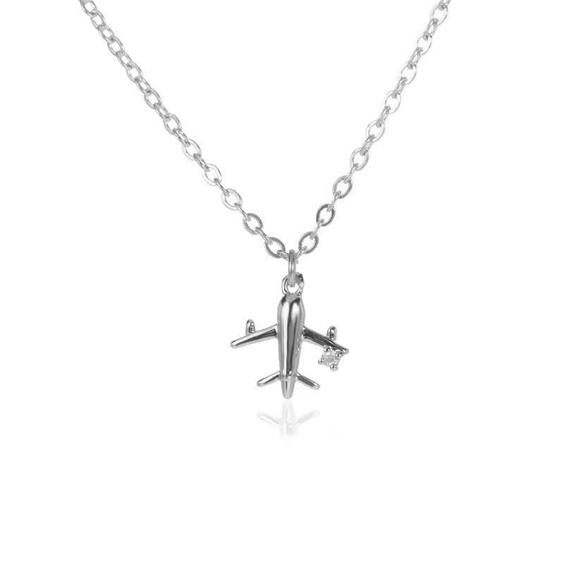 COLLAR TRAVEL MINIMALISTA & CRISTAL DIJE DE AVIÓN
