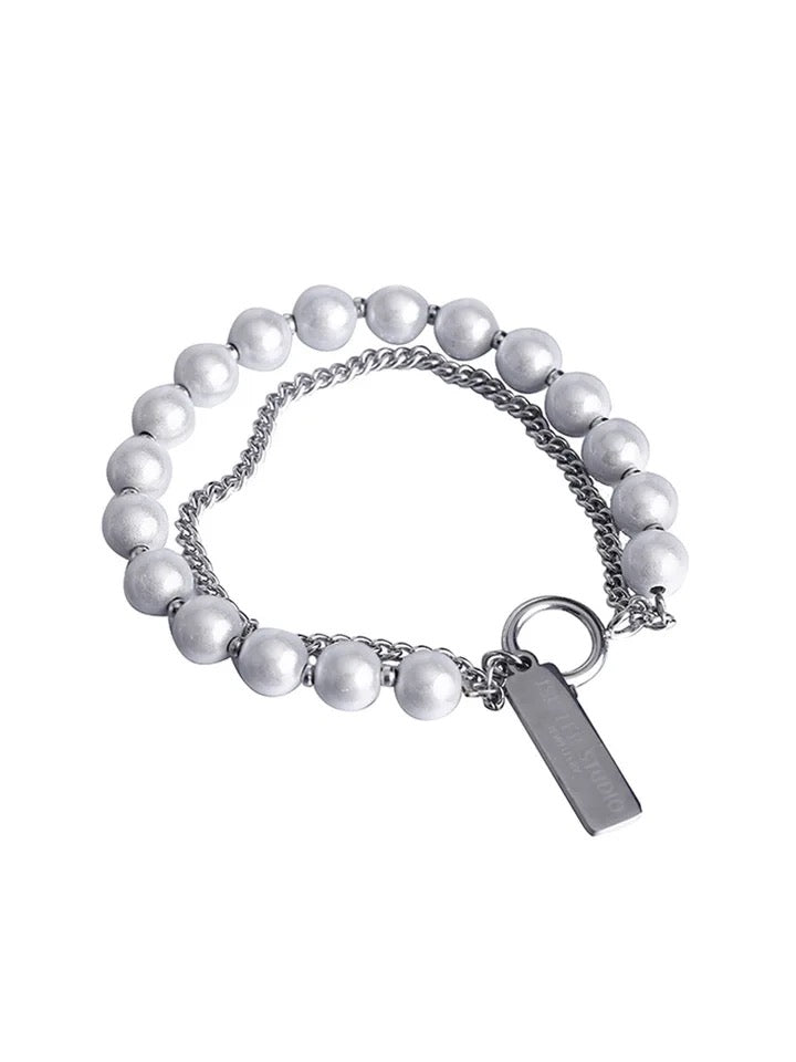 BRAZALETE DE PERLAS REFLECTANTES