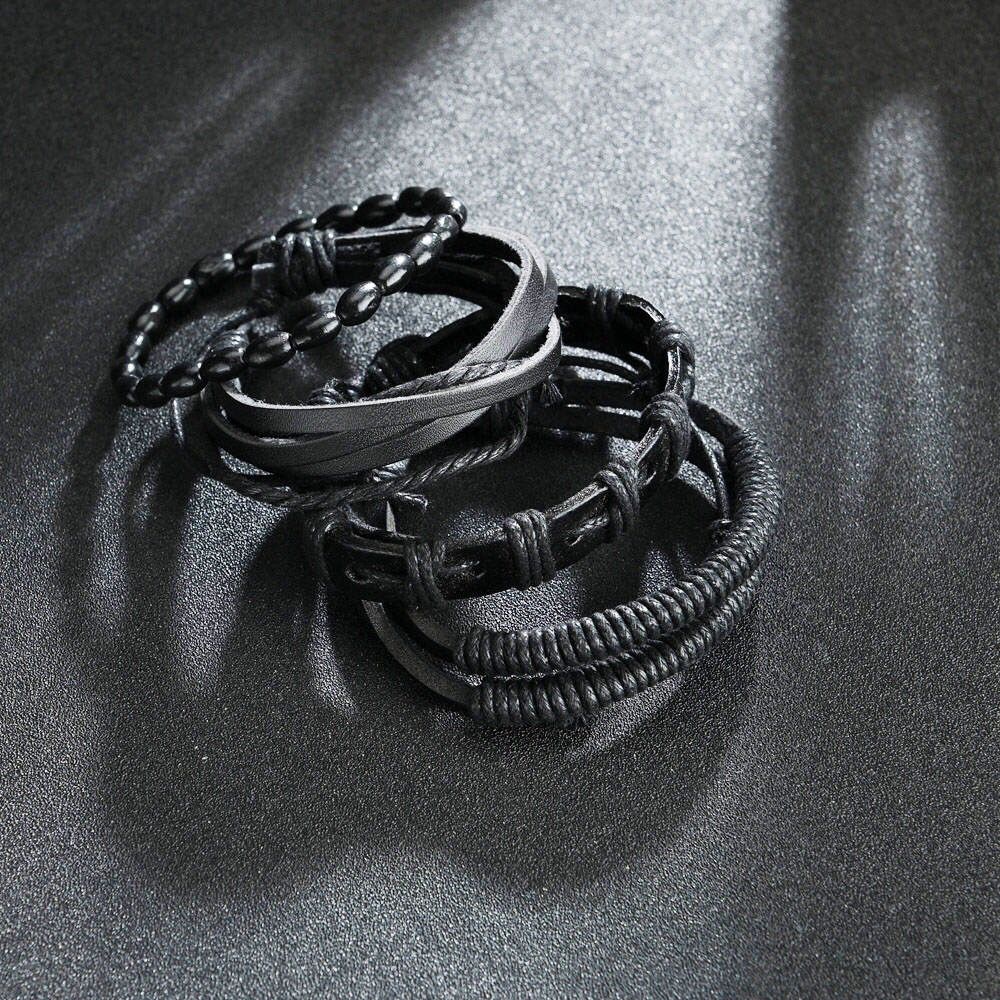 SET DE BRAZALETES EN CUERO