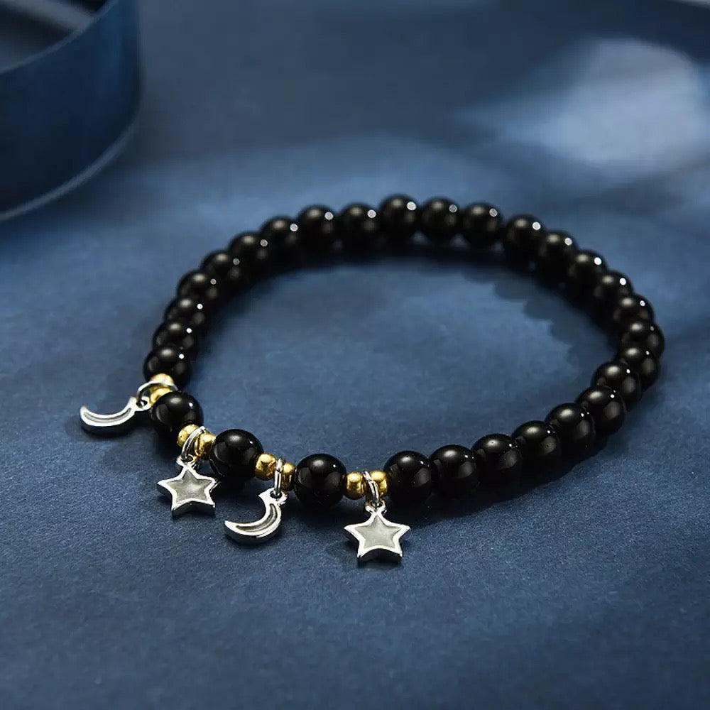 BRAZALETE ESTRELLAS Y LUNA BRILLA EN LA OSCURIDAD