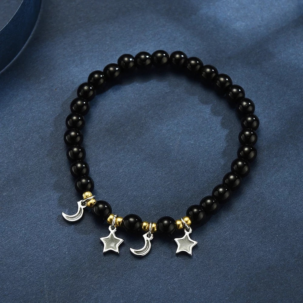 BRAZALETE ESTRELLAS Y LUNA BRILLA EN LA OSCURIDAD
