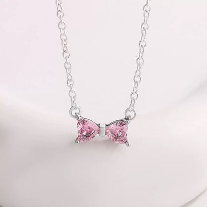 COMBO COLLAR ARETES ANILLO  LAZO  CRISTALES INCRUSTADOS GIRATORIA