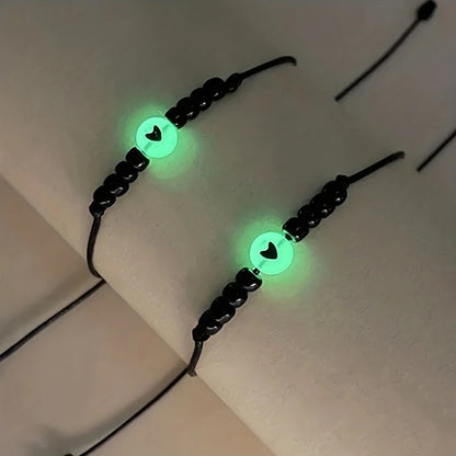 PULSERAS  HILO TEJIDO CORAZONES BRILLAN EN LA OSCURIDAD