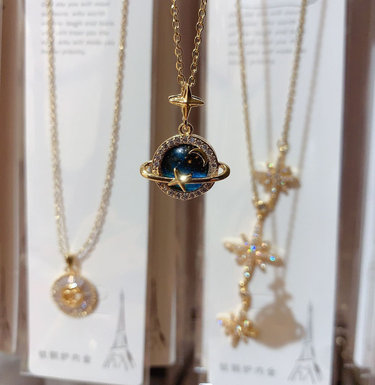 COLLAR SATURNO  ESTRELLADO ELEGANTE CRISTAL DE CIRCONIA