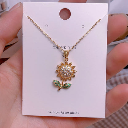 COLLAR FLOR GIRASOL CRISTALES INCRUSTADOS  GIRATORIO MINIMALISTA