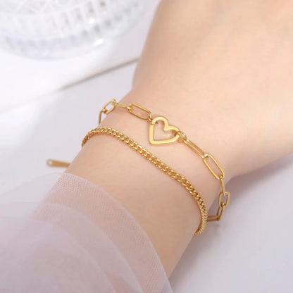 BRAZALETE CORAZÓN HUECO DOBLE CADENA