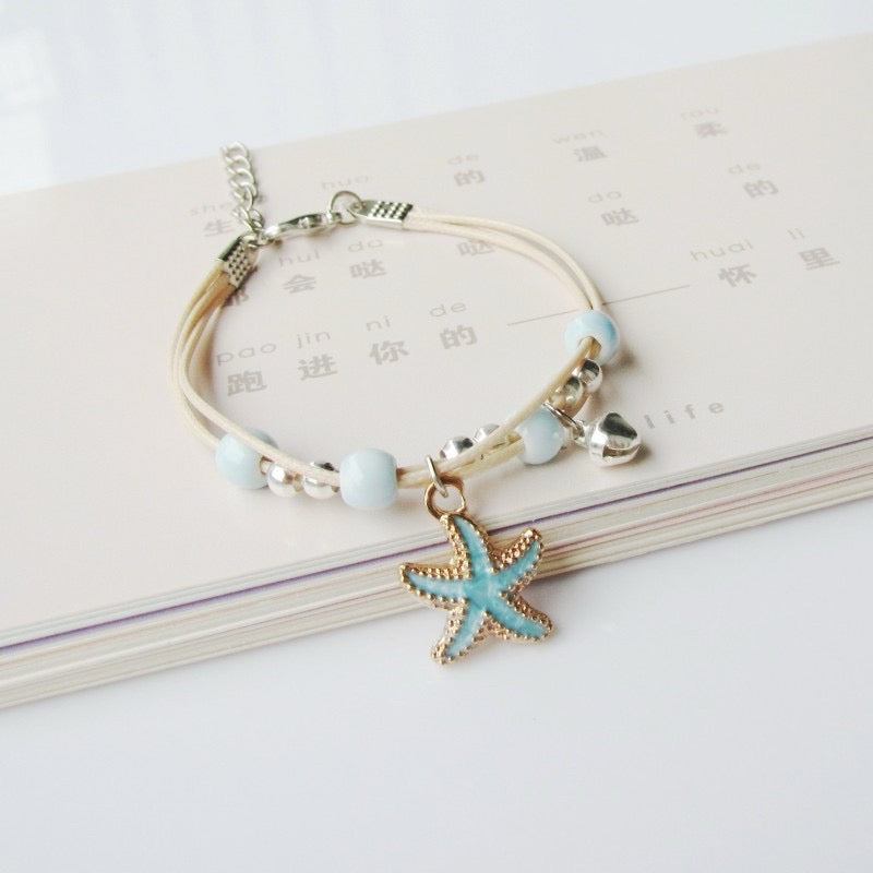 BRAZALETE DE CERÁMICA CONCHAS DE MAR
