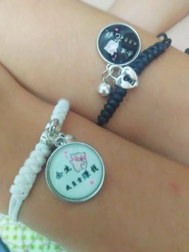 PULSERAS DE PAREJA BRILLA EN LA OSCURIDAD KAWAII CON EXHIBIDOR