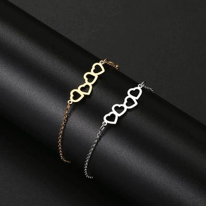 BRAZALETE CORAZONES ENLAZADOS MINIMALISTA