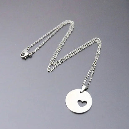 COLLAR CÍRCULO  CORAZÓN AHUECADO UNISEX MINIMALISTA