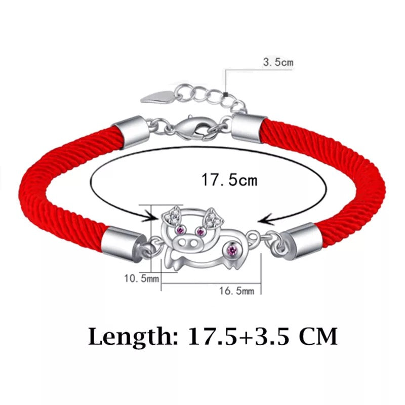 BRAZALETE CERDITO DE LA SUERTE  TEJIDO