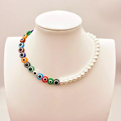 COLLAR CHOCKER DE PERLAS OJO TURCO