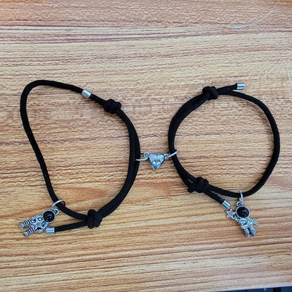 BRAZALETES MAGNÉTICOS  ASTRONAUTA IMAN DE CORAZÓN