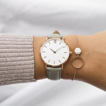 RELOJ DELICADO NÚMEROS ROMANOS