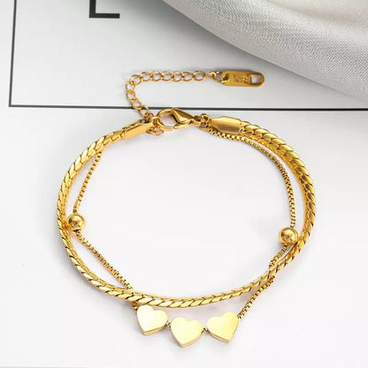 BRAZALETE ELEGANTE CORAZONES MINIMALISTAS